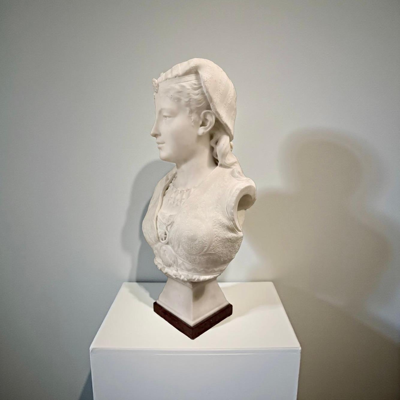 Zacharie Rimbez (attivo tra 19 e 20 secolo). Busto orientalista in marmo bianco raffigurante Armida, seconda metà del 19 secolo.  

Armida  è una maga musulmana, personaggio della Gerusalemme liberata di Torquato Tasso. Armida è una giovane donna,