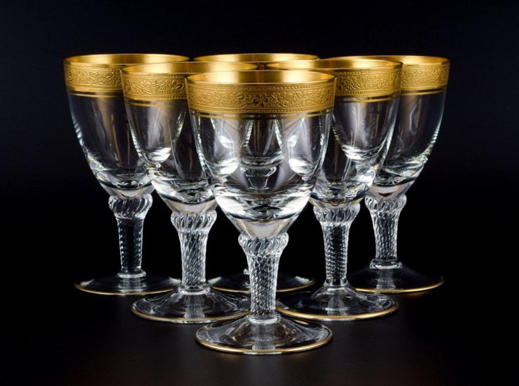 Rimpler Kristall, Zwiesel, Germany, six hand-blown crystal white wine glasses with gold rim decorated with grapes and vine leaves.
1960s.
In perfect condition.
Dimensions: H 12.2 x D 7.0 cm.
