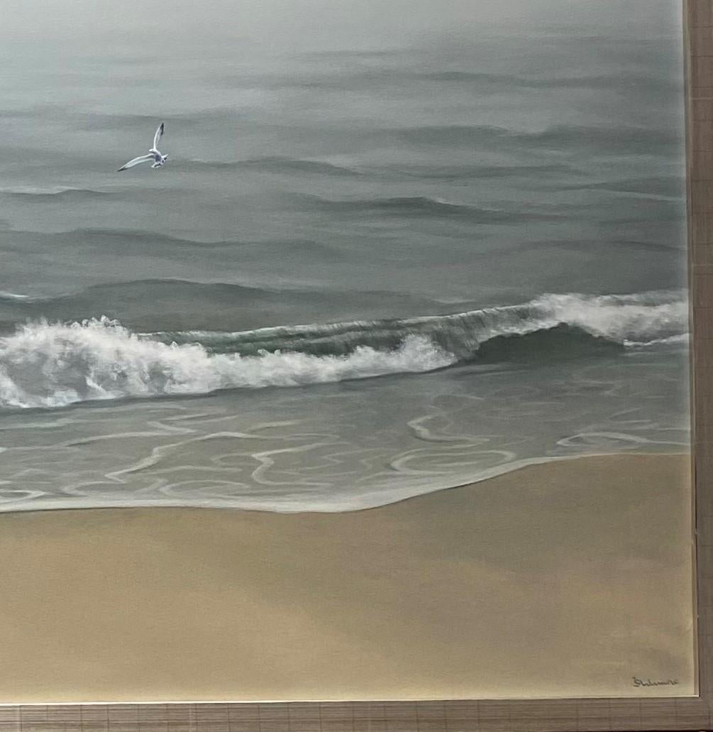 Pair the gentlest blue gray with soft shades of white and tan and you are on the journey to appreciating the morning surf in this contemporary realist marine landscape. A natural paradise, the juxtaposition of realistic elements with transitional