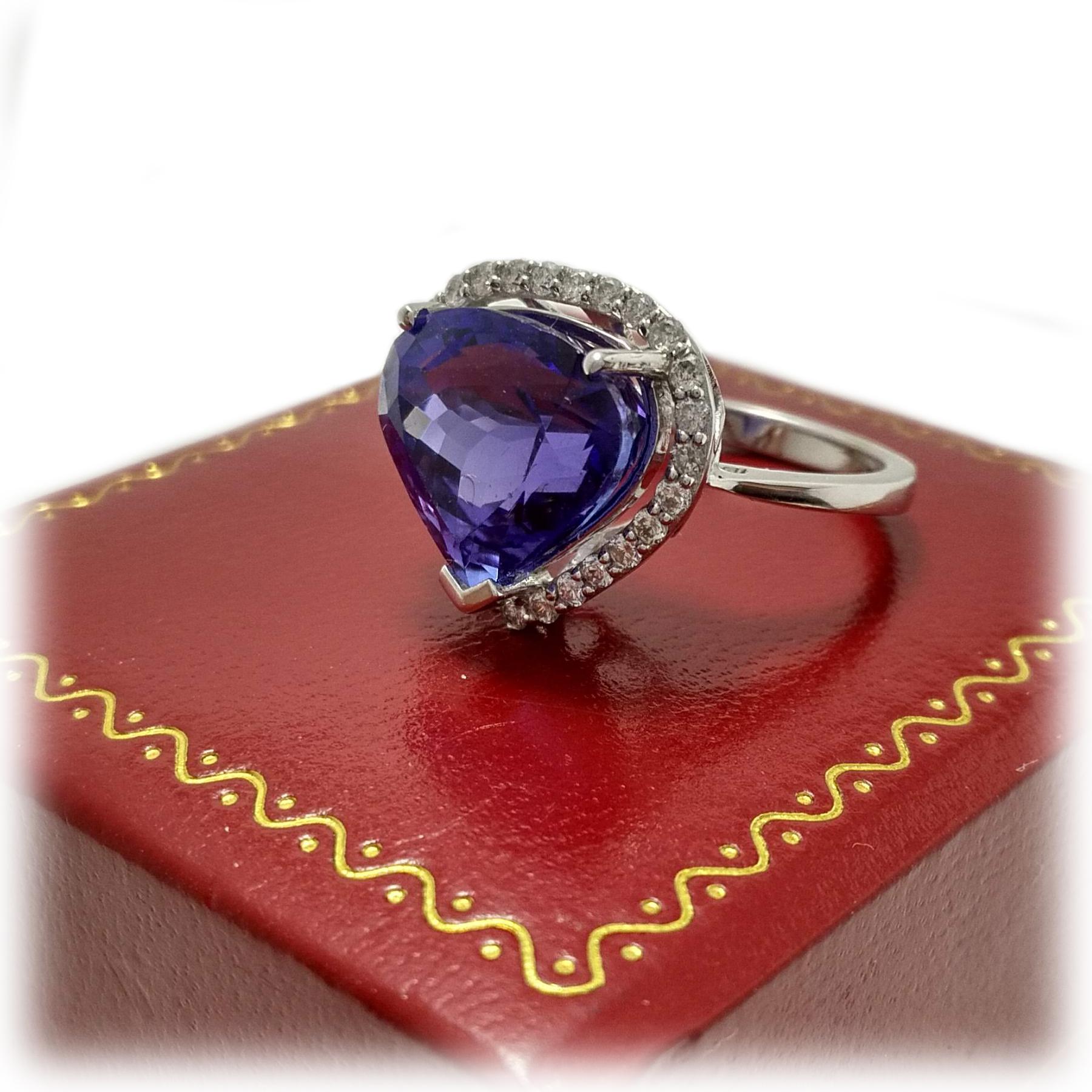 Pear Cut 6. 12 Carat Tanzanite Diamond Cocktail Ring For Sale