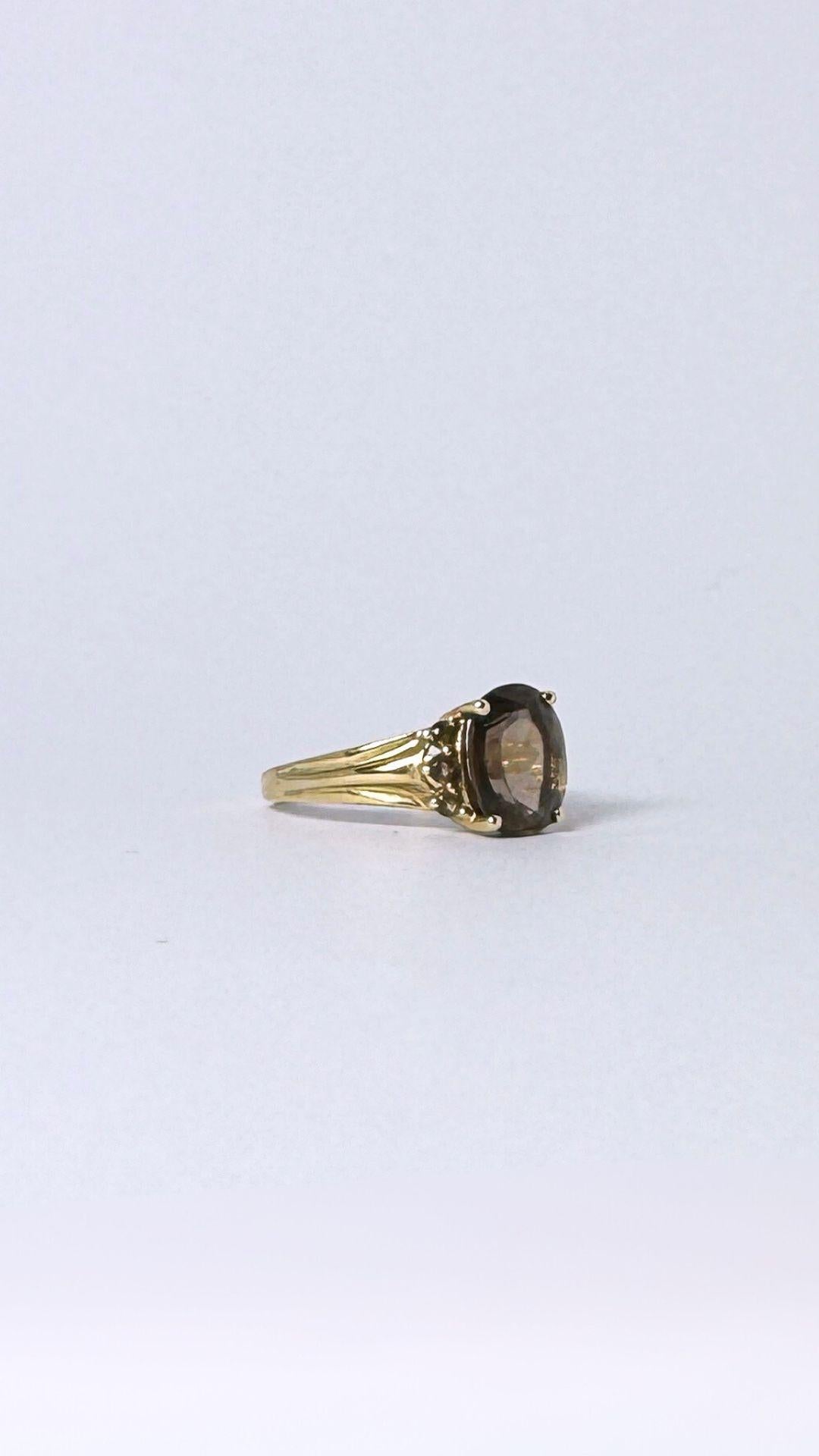 Ring 14 carat gold with smokey quarts  2 carat, surrounded with little quarts  For Sale 4