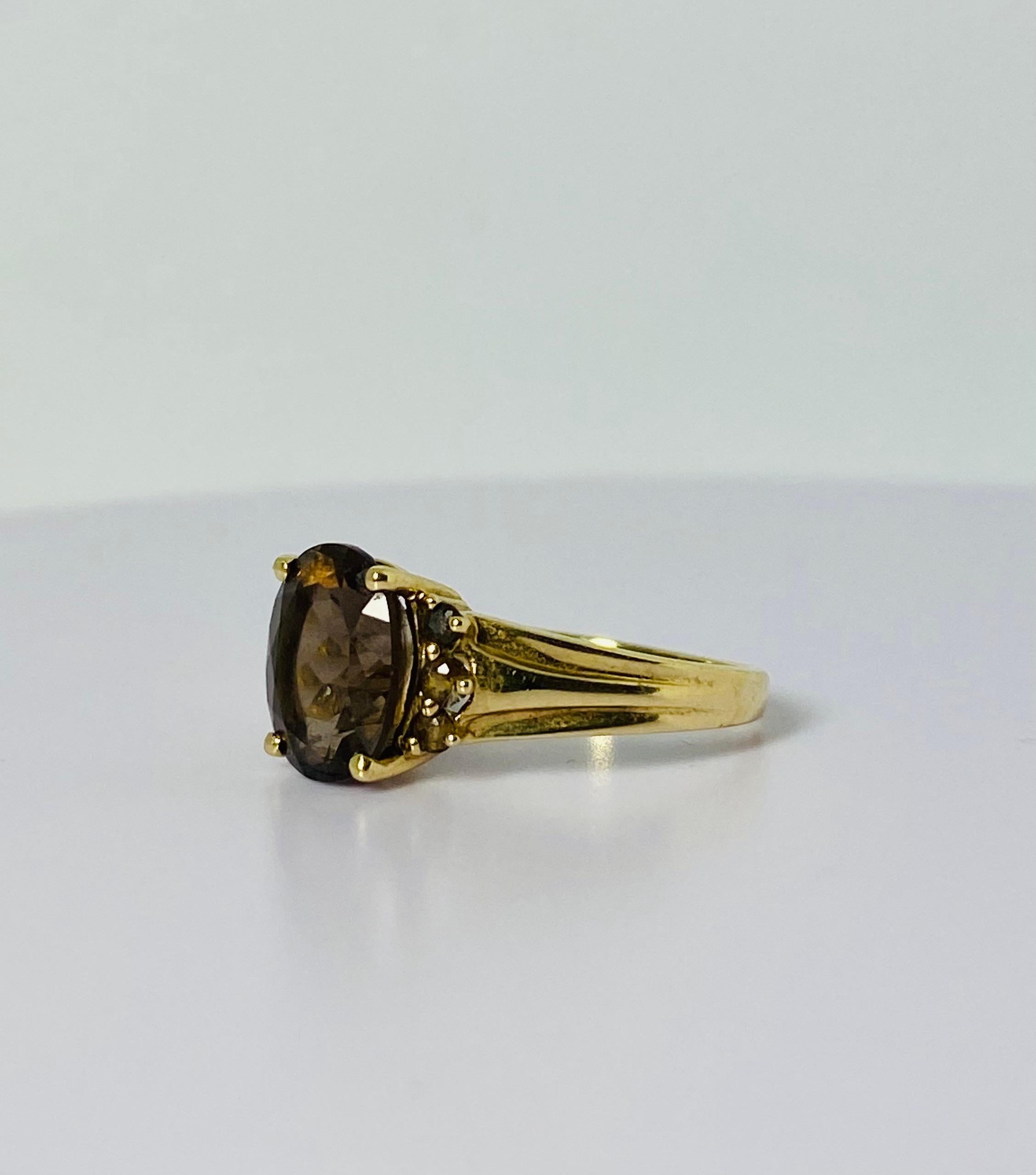 14 carat gold ring with oval 2 carat smoky quartz  2 carat and 6 smokey quarts In Good Condition In Heemstede, NL