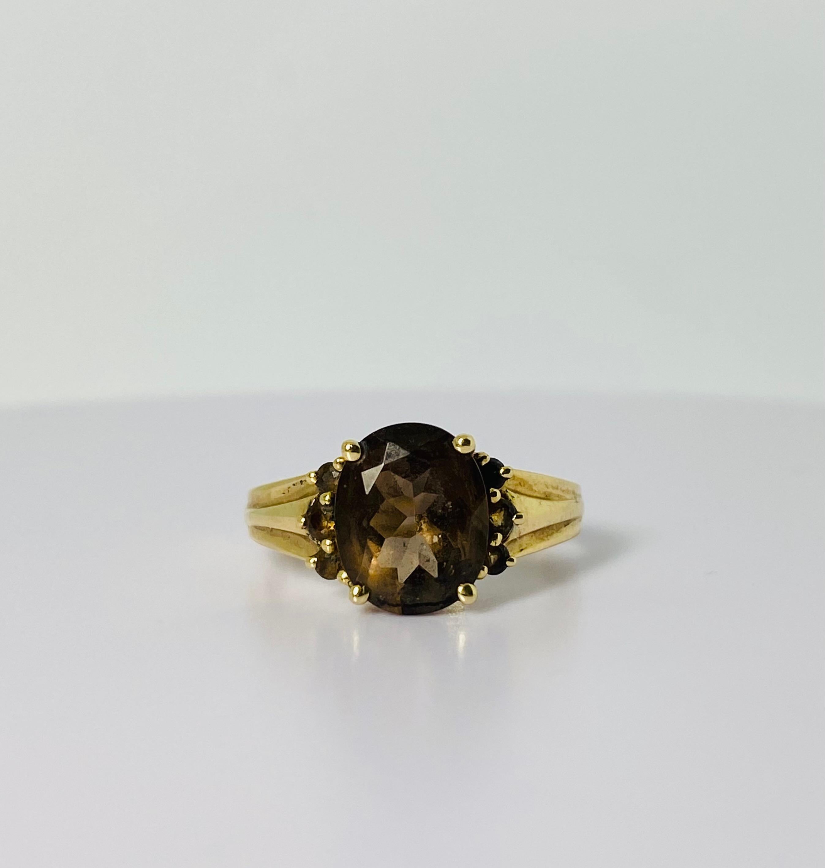 Post-War 14 carat gold ring with oval 2 carat smoky quartz  2 carat and 6 smokey quarts