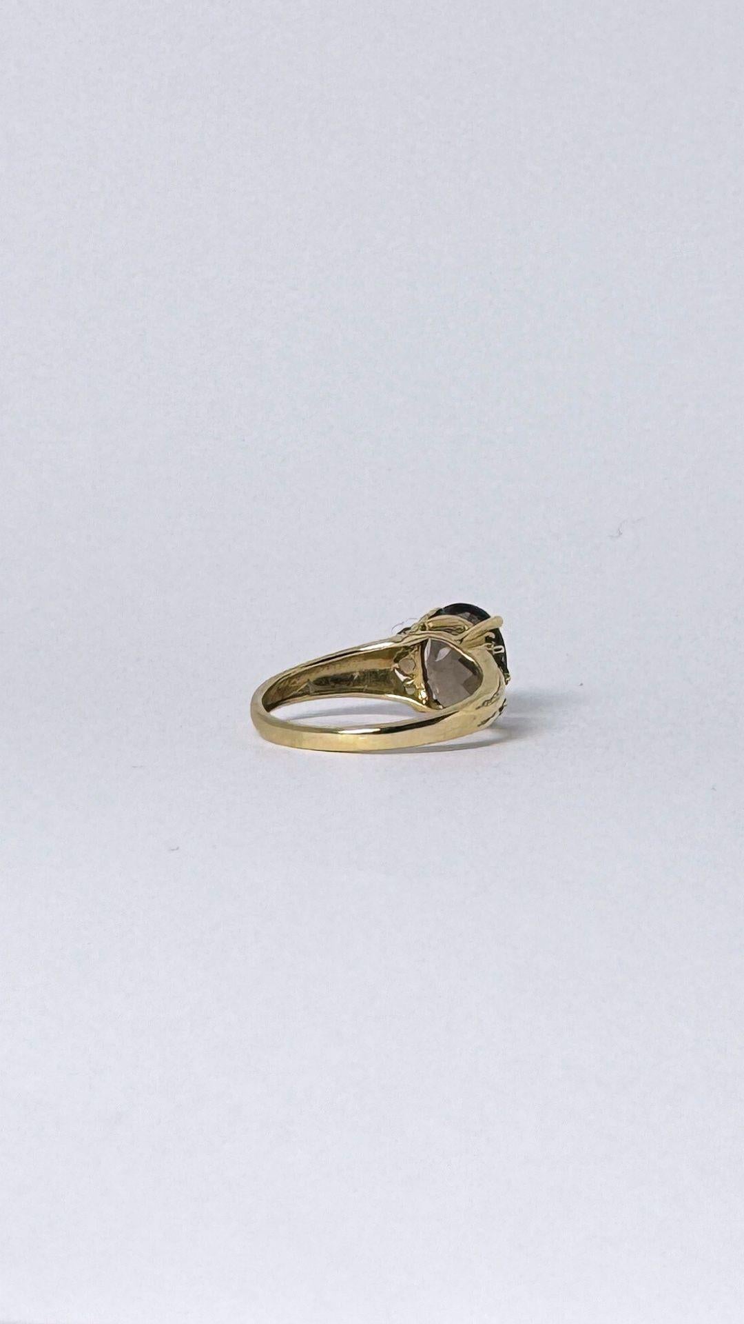 Ring 14 carat gold with smokey quarts  2 carat, surrounded with little quarts  For Sale 2