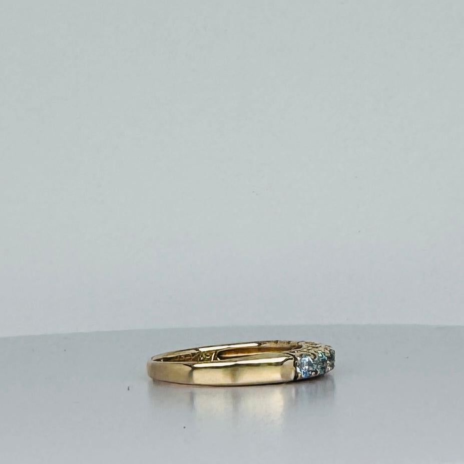 Ring 14 carat yellow gold with 7 round cut aquamarines 2