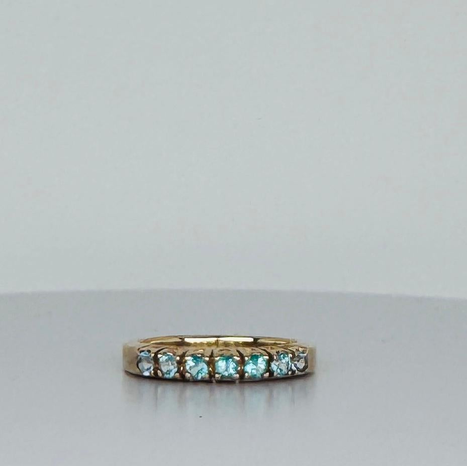 Ring 14 carat yellow gold with 7 round cut aquamarines 3