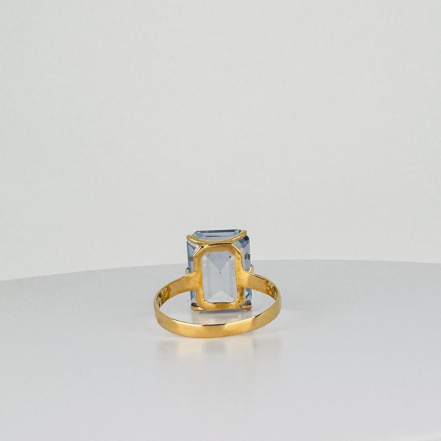 Bague en or jaune 14k avec topaze bleue taille émeraude 2 carats en vente 2