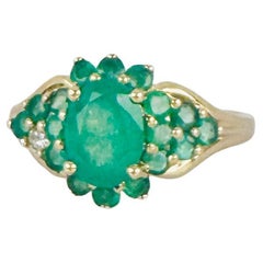Ring 14k Gelbgold mit natürlichem Diamant VS 0,04 Karat & Smaragden