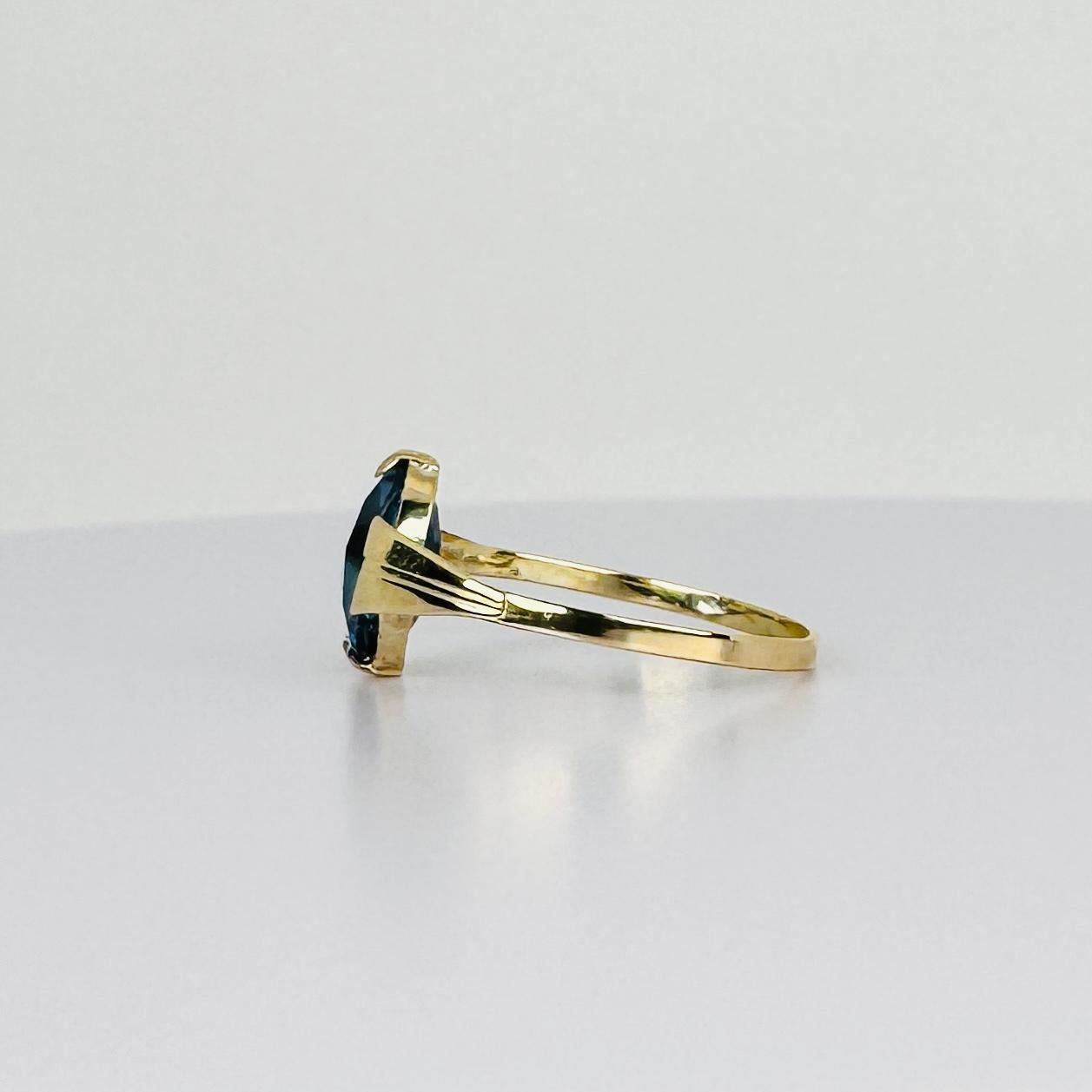 Bague en or jaune 14k avec aigue-marine ovale facettée d'environ 1,20 carat Bon état - En vente à Heemstede, NL