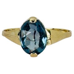 Bague en or jaune 14k avec aigue-marine ovale facettée d'environ 1,20 carat