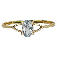 Anello in oro giallo 14k con acquamarina ovale Nature Light da 0,5 carati