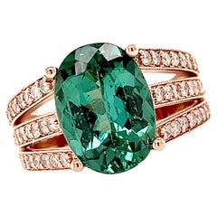 Bague en or 14 carats, tourmaline verte ovale 4,52 carats et diamants 0,63 carat Tige fendue