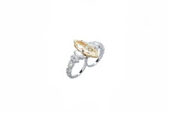 Fancy Light yellow 11, 78ct Diamond Ring