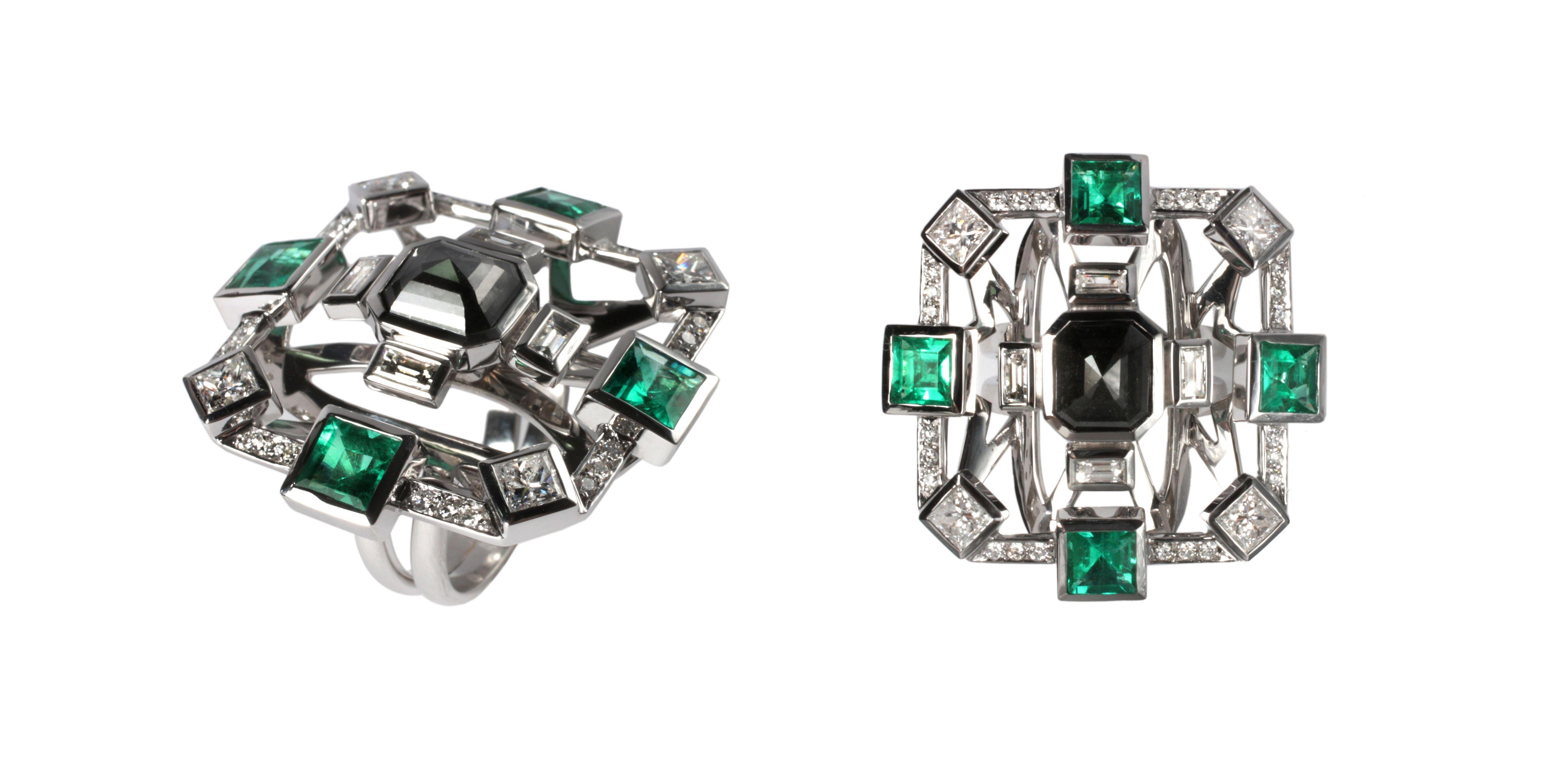 Designed exclusively by Ara Vartanian, this 18k White Gold Ring features four Emeralds, in a Princess cut, with a total weight of 2,89ct (two carats and eighty-nine points),  one Black Diamond in a Emerald Shape rose cut, along with four White