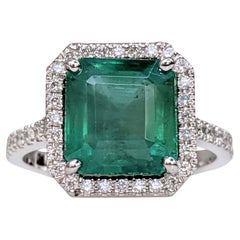 Ring - 18 kt. White gold - 4.93ct. tw. Emerald - Diamond