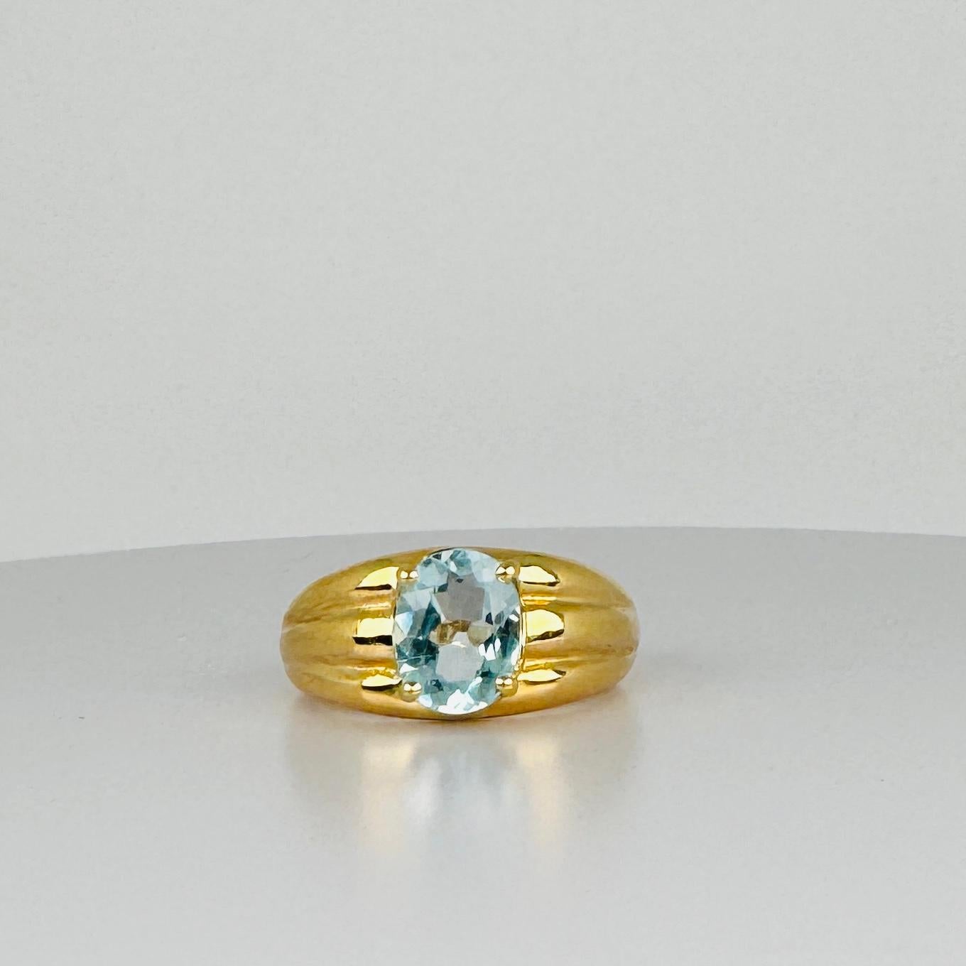 Scopri la forma unica e il design straordinario di questo anello a 18 carati! Caratterizzato da una vibrante acquamarina, questo anello è un'occasione per farsi notare. Non perdere l'occasione di aggiungere questo pezzo forte alla tua