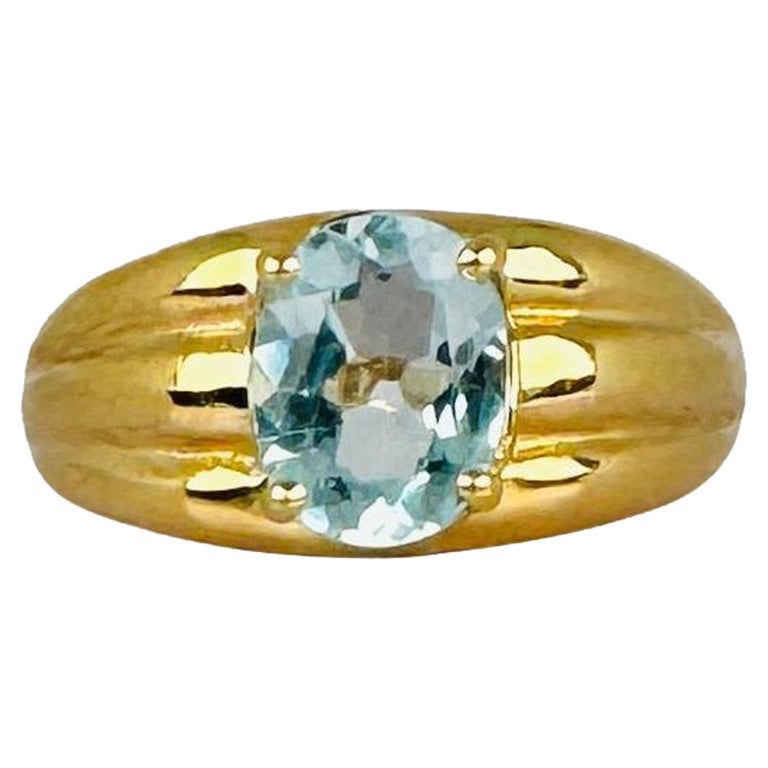 Bague en or jaune 18 carats avec aigue-marine ovale 2 carats