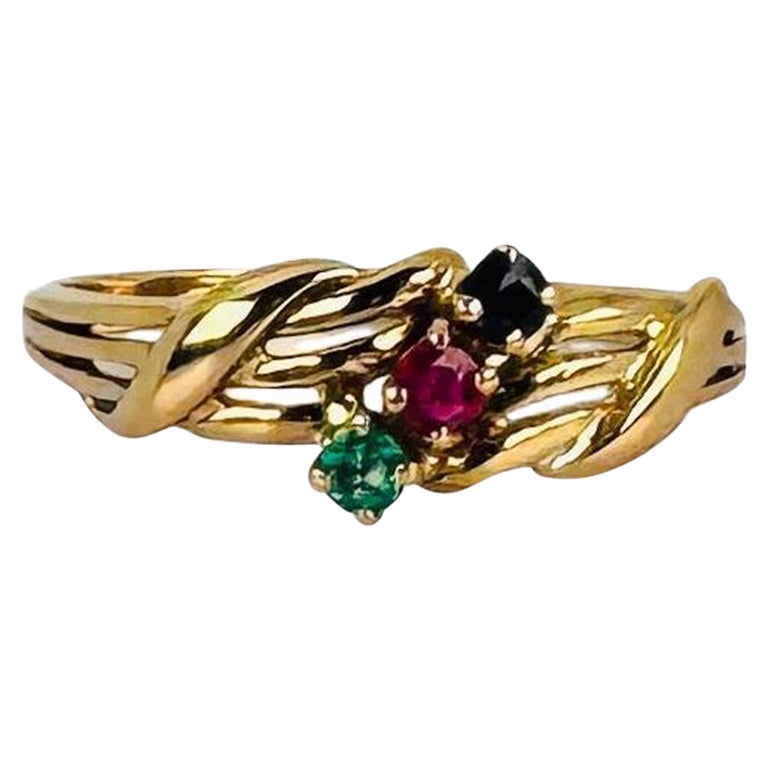 Bague vintage en or jaune 18 carats avec rubis, émeraude et saphir bleu 0,06 carat
