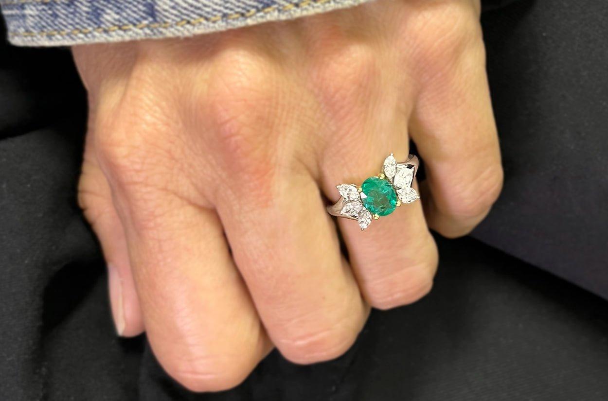 Contemporary Ring 18kt Gold Majestic GIA Oval Emerald 0.98 cts & Marquise Diamonds 0.83 cts. For Sale