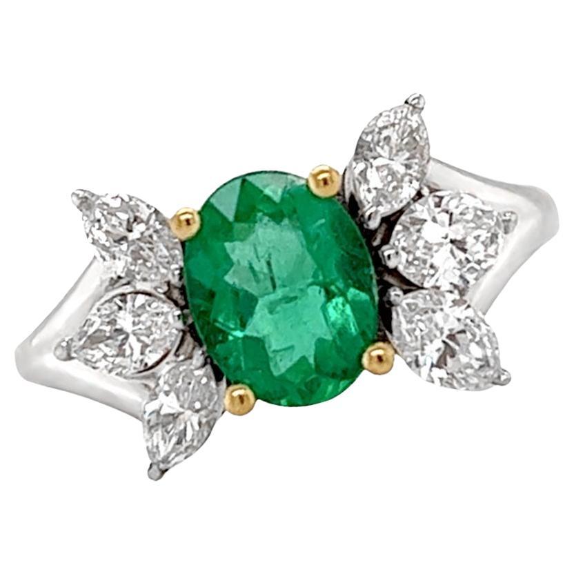 Ring 18kt Gold Majestic GIA Oval Emerald 0.98 cts & Marquise Diamonds 0.83 cts. For Sale