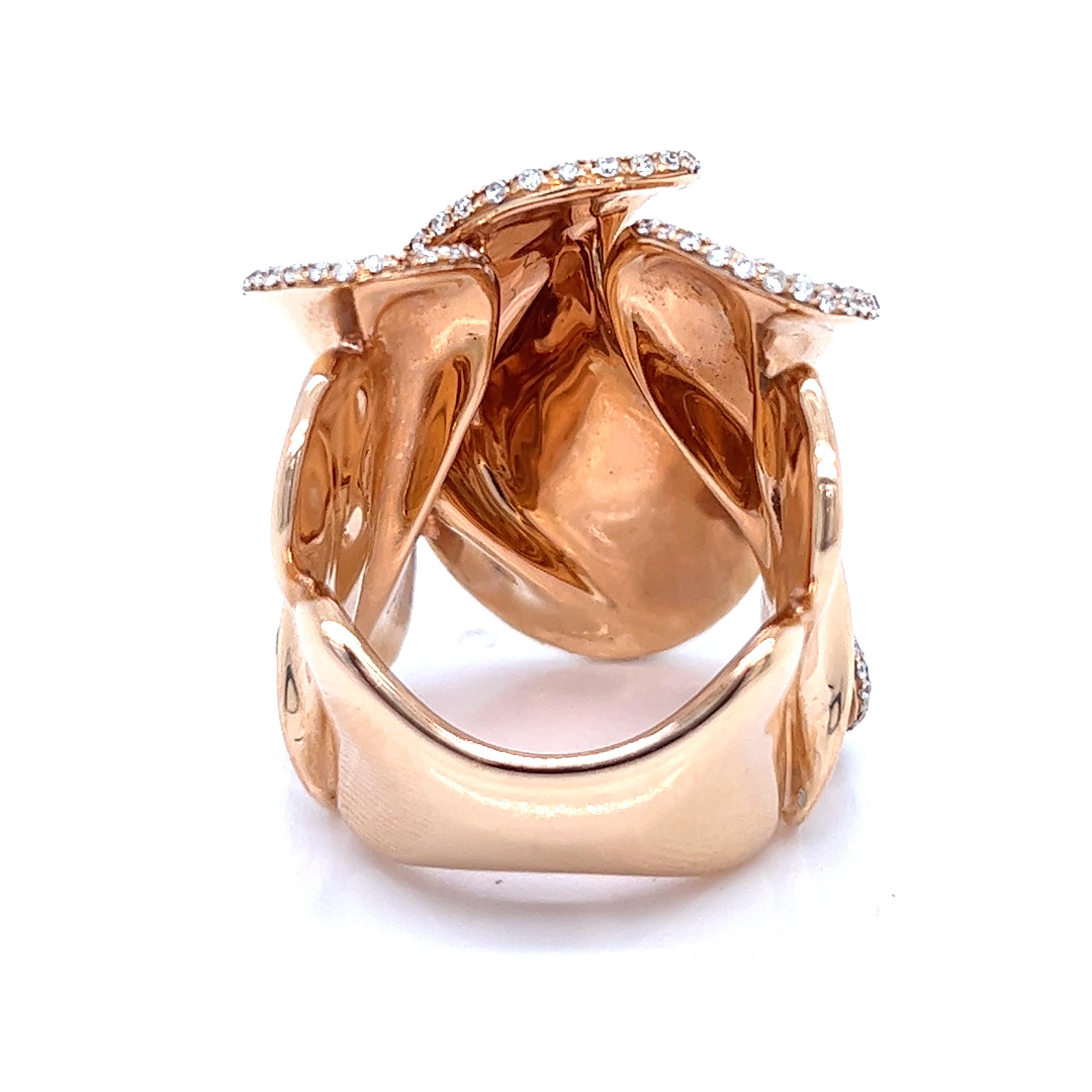 This exquisite Wave Freeform ring, meticulously crafted in Italy from lustrous 18kt rose gold, gracefully encircles your finger with a shimmering embrace. Adorned with a lavish ensemble of diamonds, their collective weight reaching a mesmerizing