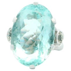 Ring 18kw lg oval 36ct aqua braided shank 2 side dias 1ct tw