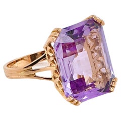 Ring Adorned With An Emerald-Cut 18-Carat Gold Ametrine