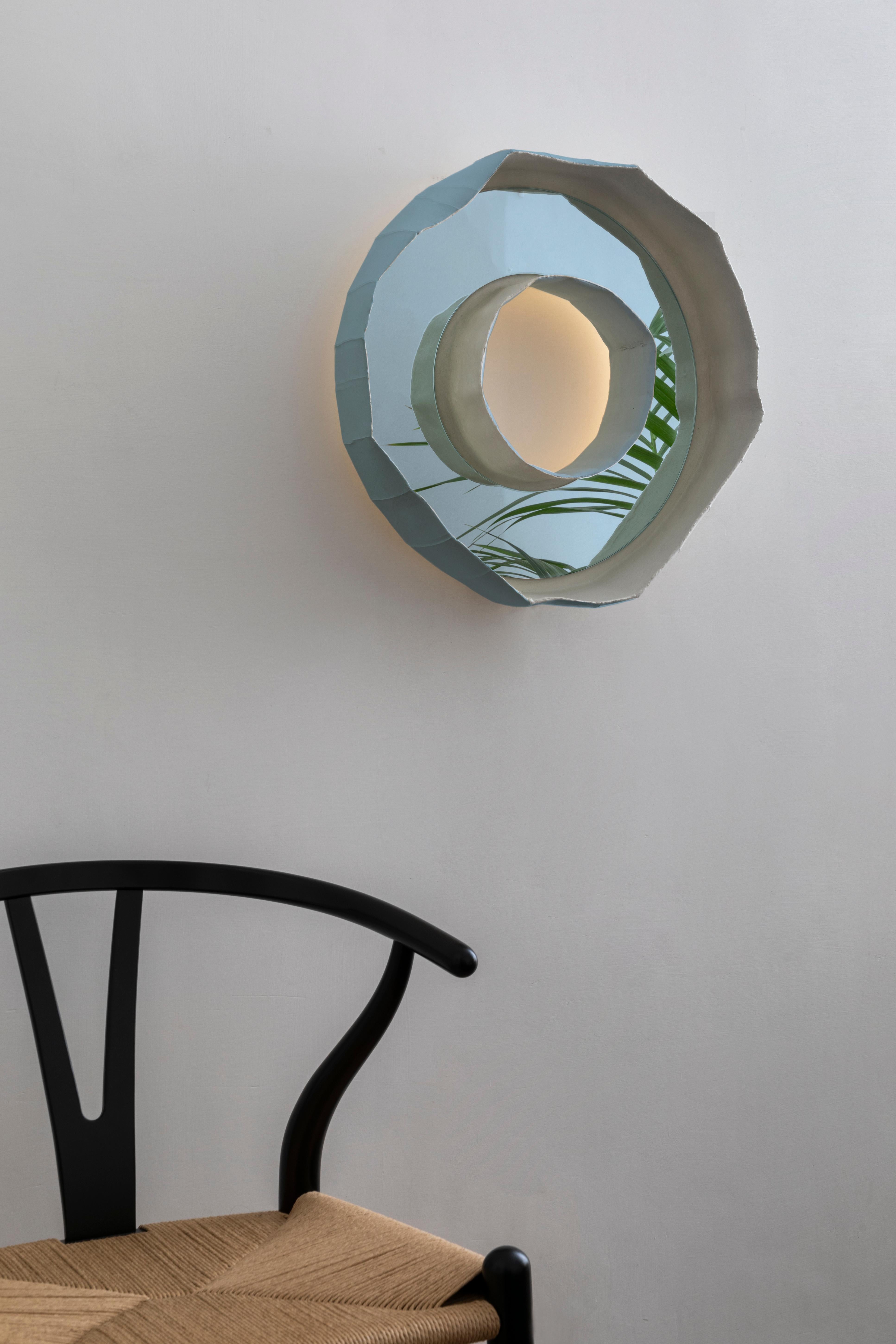 Ring Aura, stunning mirror-lamp handmade in Italy, one of 2 designs that make up the collection Reflections, the result of a collaboration between artist Paola Paronetto & designer Giovanni Botticelli, that integrates ceramic with colour, glass and