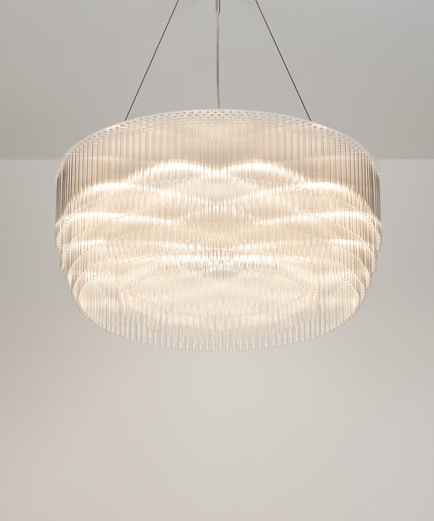 The magnificent five-tier Ring Chandelier combines a mesmerising arrangement of light and pattern. This special light is available in four different diameters ranging from 750mm to 1500mm. Strong, graceful and unique, it is designed to be the focal