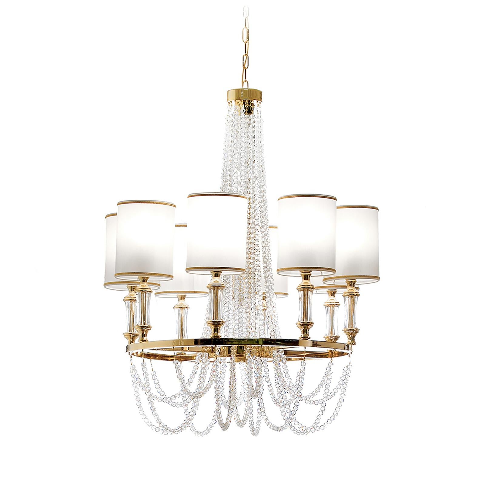 Inspired by Art Deco and crafted using traditional methods, this exquisite chandelier has a Classic design that creates a romantic setting in a bedroom, entryway, or living room. The metal structure is skillfully welded and brushed by hand with a