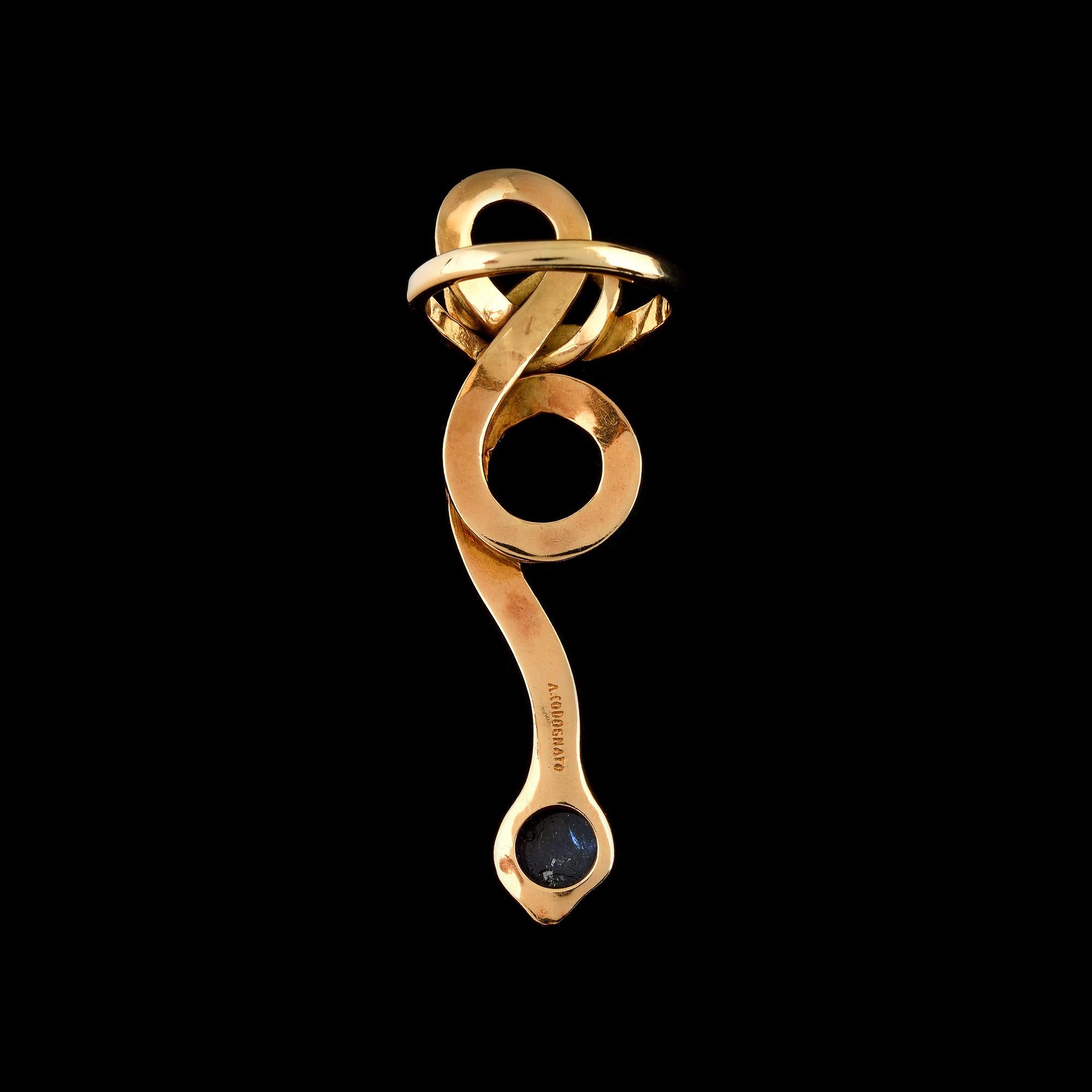 18K Yellow Gold and a Round Cabochon-cut Blue Sapphire weighing approx. 1.50 ct
Signed A. Codognato
Dimension: 6 cm
Weight: 15 grams
Ring size: 18.5
