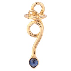 Anello Codognato in oro e zaffiro blu rotondo tagliato a cabochon