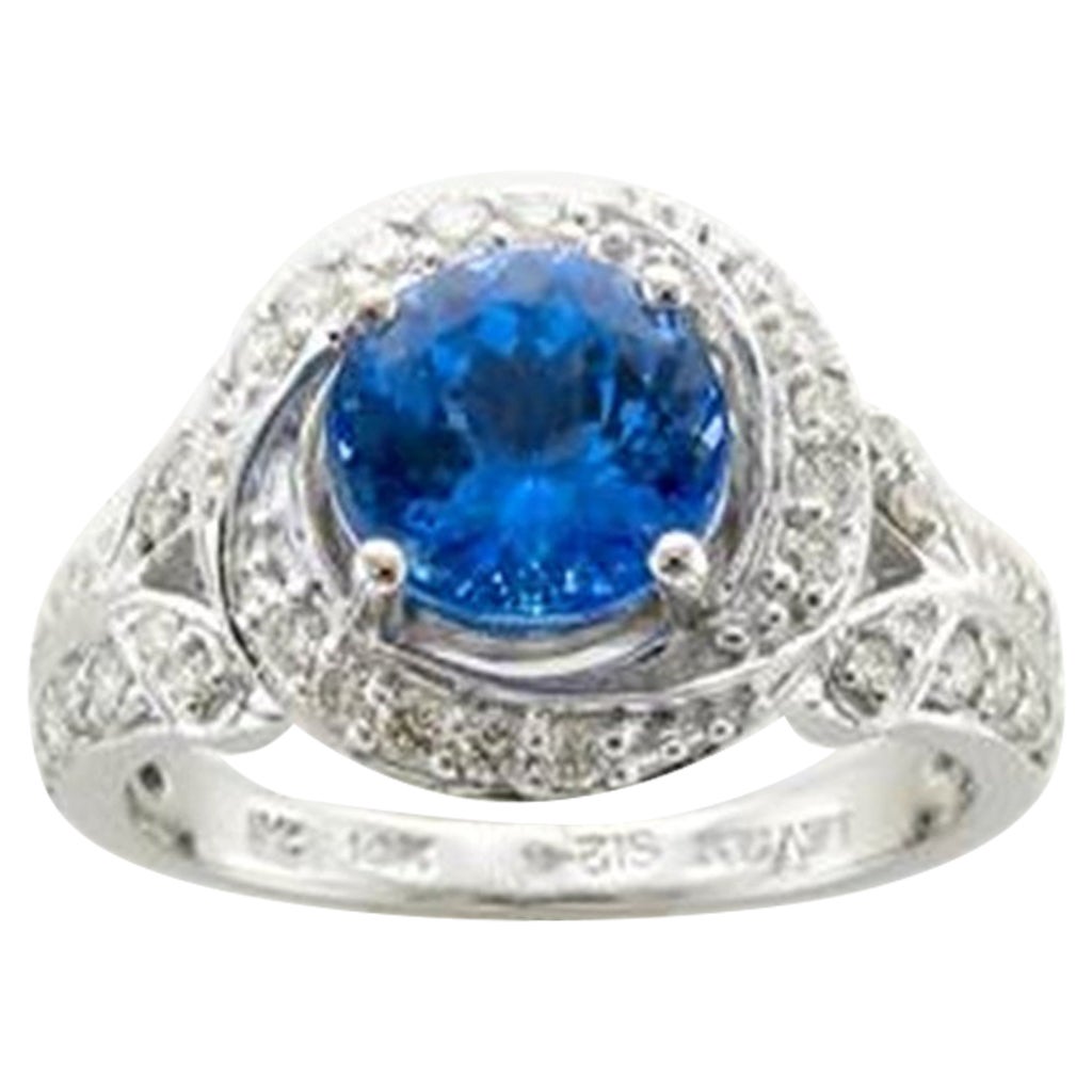 Anello con tanzanite blu e diamanti vaniglia incastonati in oro vaniglia 14K