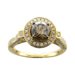 Anello con diamanti cioccolato e diamanti vaniglia incastonati in oro miele 14K