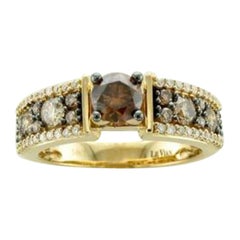 Anello con diamanti cioccolato e diamanti vaniglia incastonati in oro miele 14K