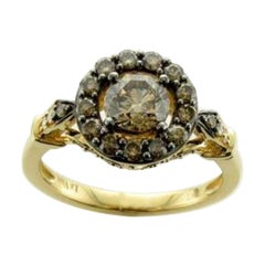Anello con diamanti cioccolato e diamanti vaniglia incastonati in oro miele 14K