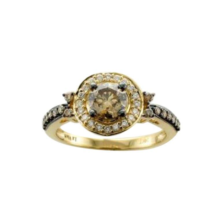 Anello con diamanti cioccolato e diamanti vaniglia incastonati in oro miele 14K