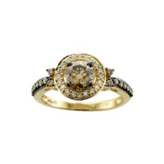 Anello con diamanti cioccolato e diamanti vaniglia incastonati in oro miele 14K