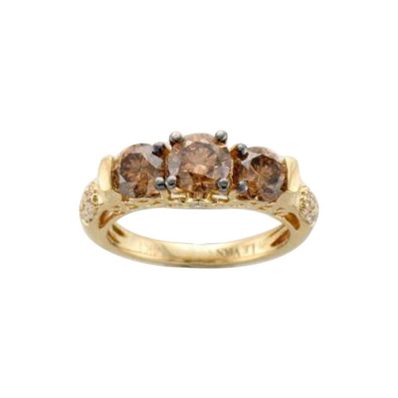Anello con diamanti cioccolato e diamanti vaniglia incastonati in oro miele 14K