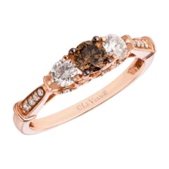 Bague avec diamants chocolat , diamants vanille sertis en or fraise 14 carats
