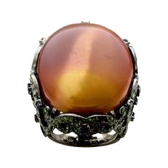 Ring featuring Mookaite, Blueberry Sapphire, Forest Green Tsavorite set in SLV
