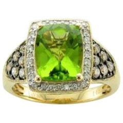 Ring featuring Peridot Chocolate & Vanilla Diamonds set in 14K Honey Gold