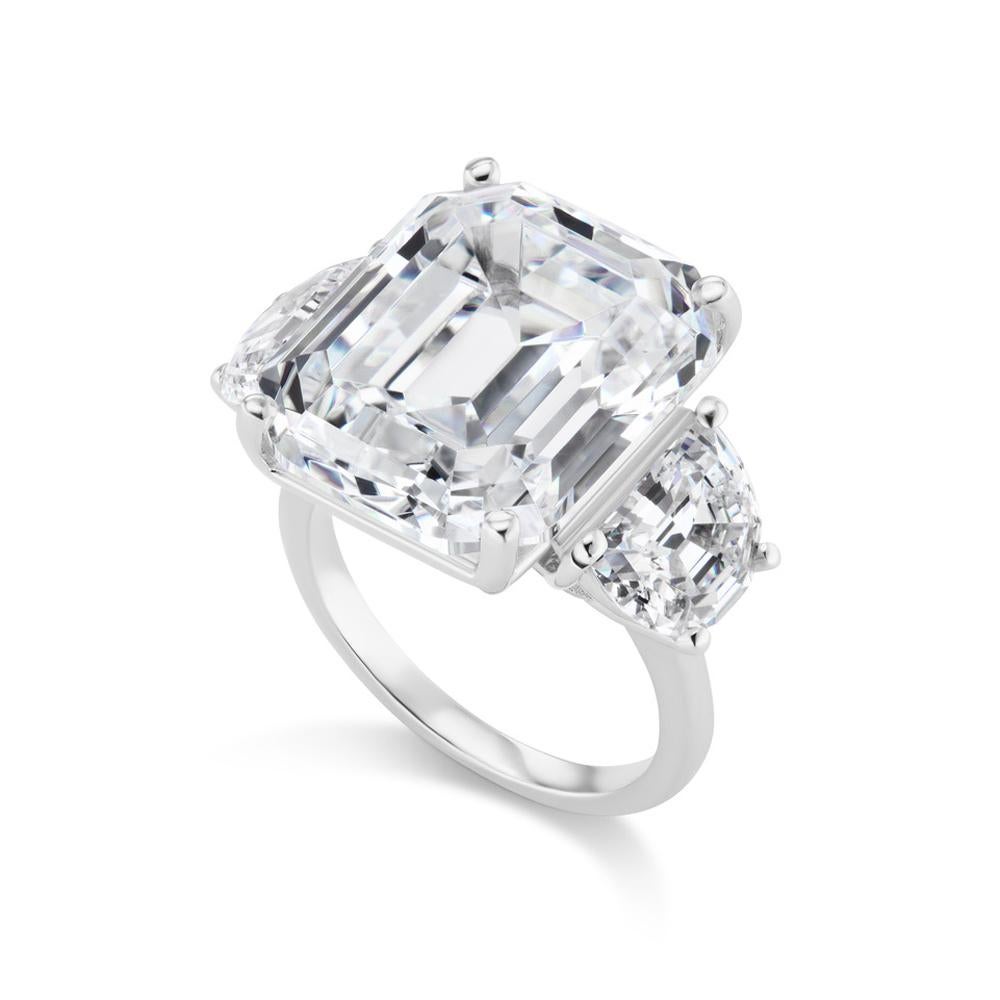 15 Quilates Diamante Cultivado en Laboratorio Corte Esmeralda Calidad CZ Anillo de Plata de Ley Platinado

Un diamante cultivado en laboratorio de grado D, tallado al estilo esmeralda y engastado con circonitas cúbicas en forma de media luna.