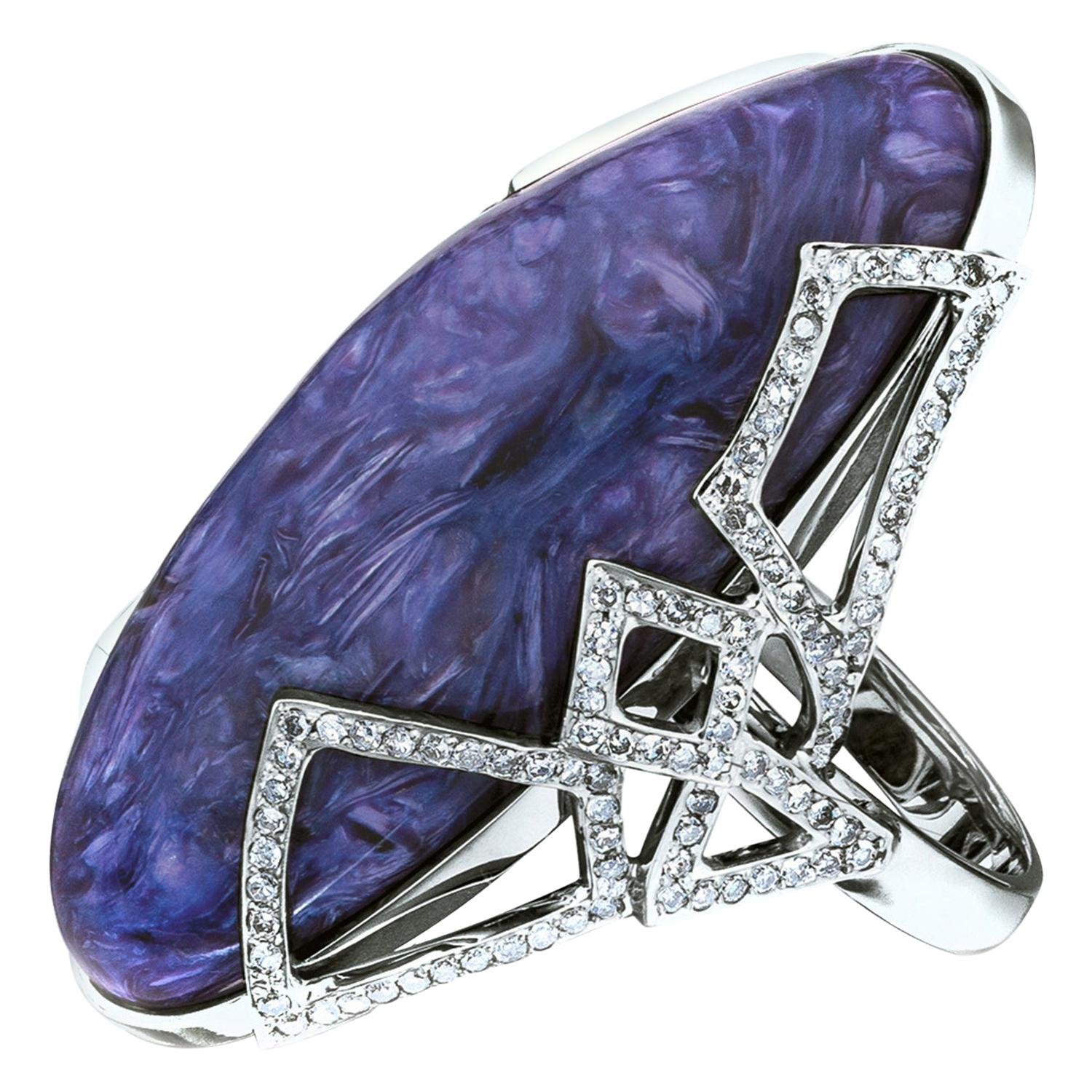 Natural fine quality Charoite ring mounted in 14K white gold and 190 Diamonds
Charoite measurements - 0.63 х 1.85 in / 16 х 47 mm
charoite weight - 46.43 carats
charoite lenght - 10 mm
weight of the ring - 19.25 grams
ring size - 7 US


We ship our