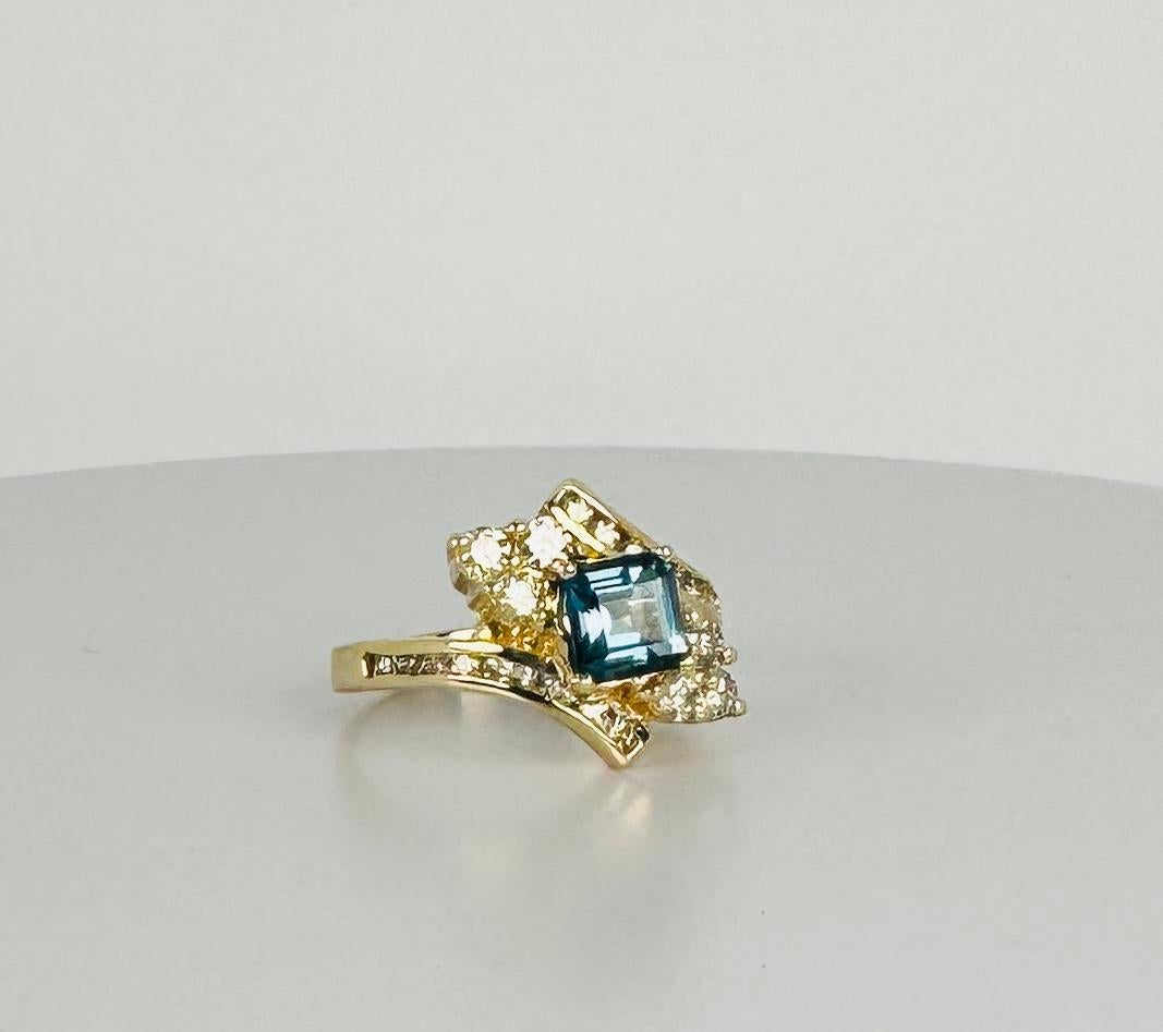 Brilliant Cut Ring yellow gold 14k with 0.48 carat diamonds and blue spinel of 1.28 carat