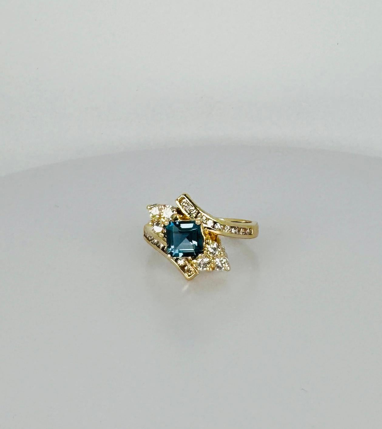 Ring yellow gold 14k with 0.48 carat diamonds and blue spinel of 1.28 carat 4