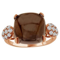 Ring in 18K Rose Gold Diamonds and Blue Topaz