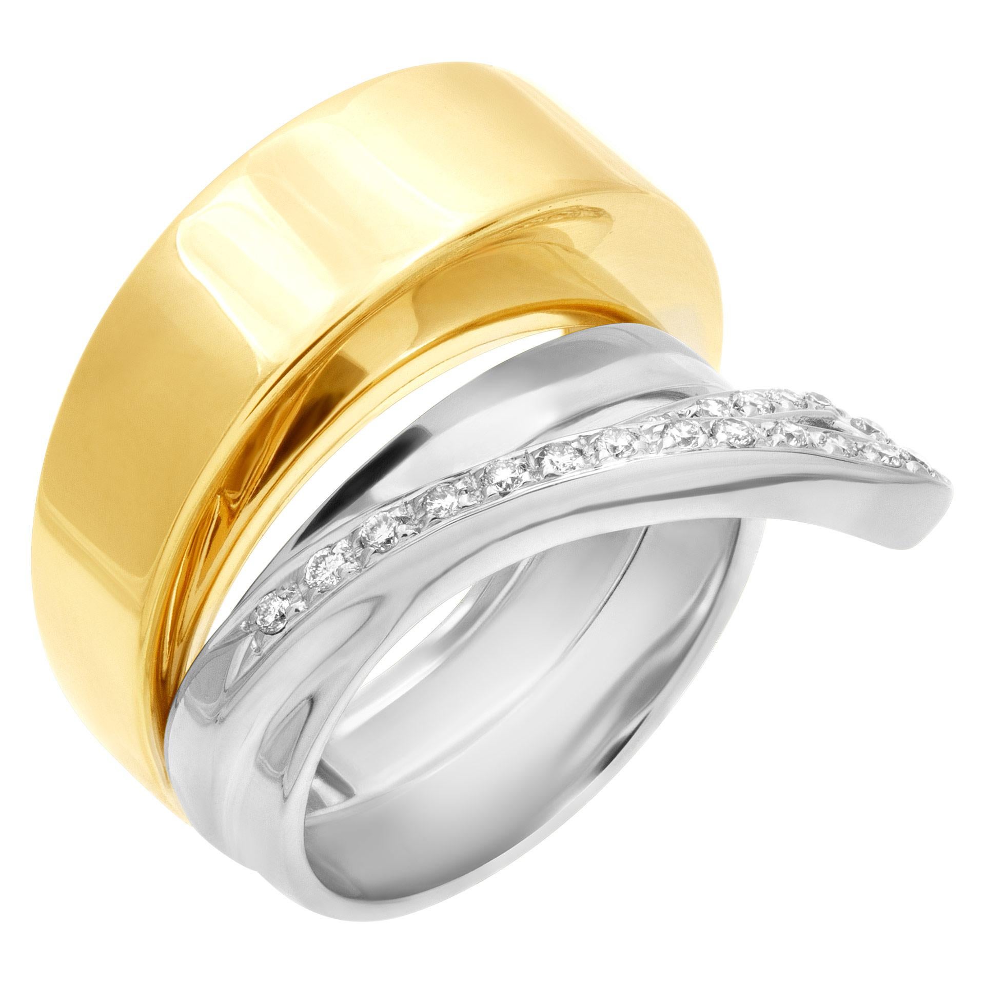 Stack ring in 18k white and yellow gold with diamond swirl approximately 0.20 carat. Size 7  This Diamond ring is currently size 7 and some items can be sized up or down, please ask! It weighs 7.6 pennyweights and is 18k White & Yellow Gold.
