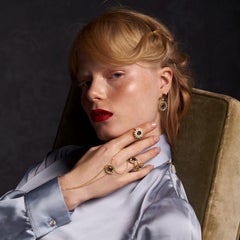 Ring in 18kt Yellow Gold Pear Iolite Peridons and Diamonds Oval Shape Cluster