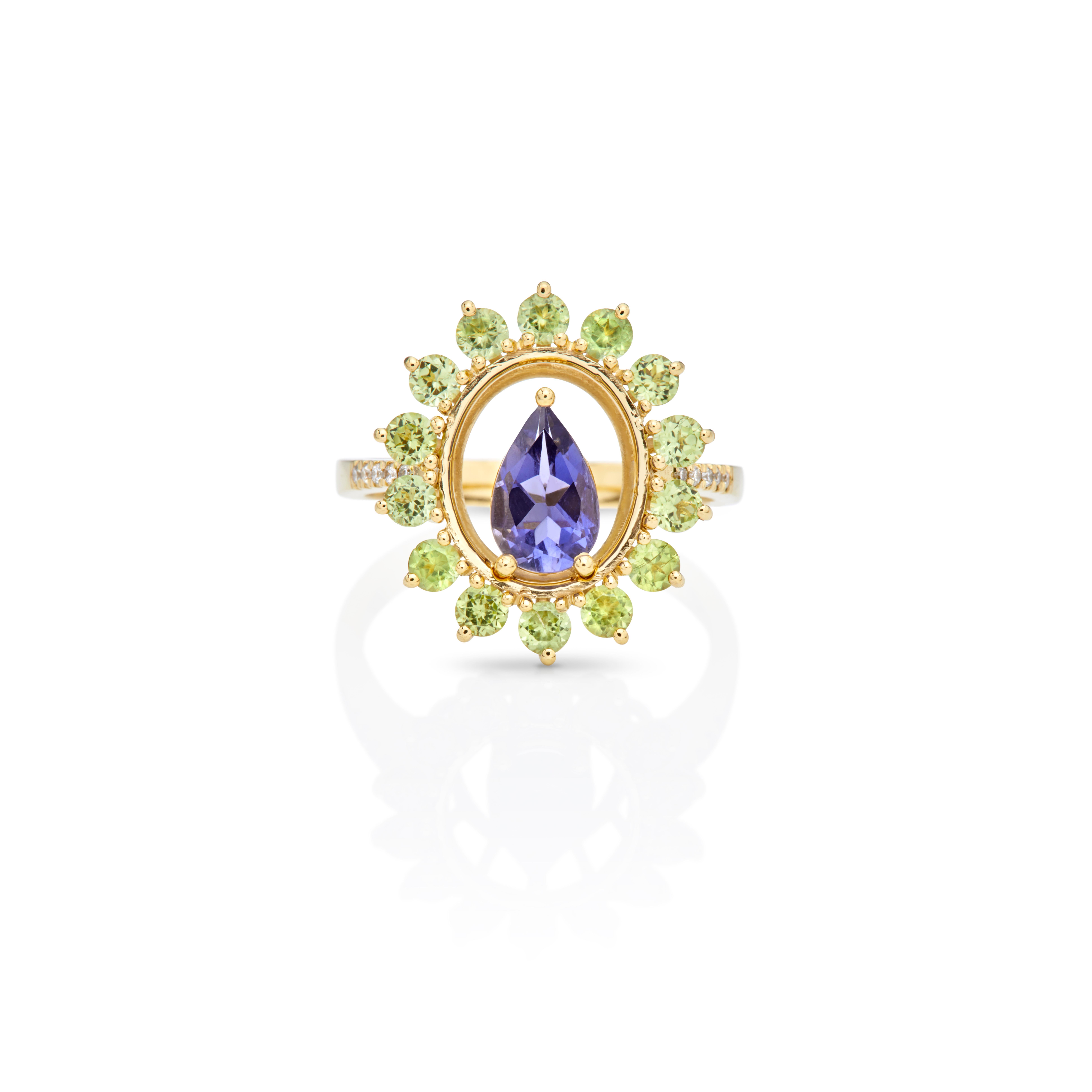 For Sale:  Ring in 18kt Yellow Gold Pear Iolite Peridots and Diamonds Oval Shape Cluster 3